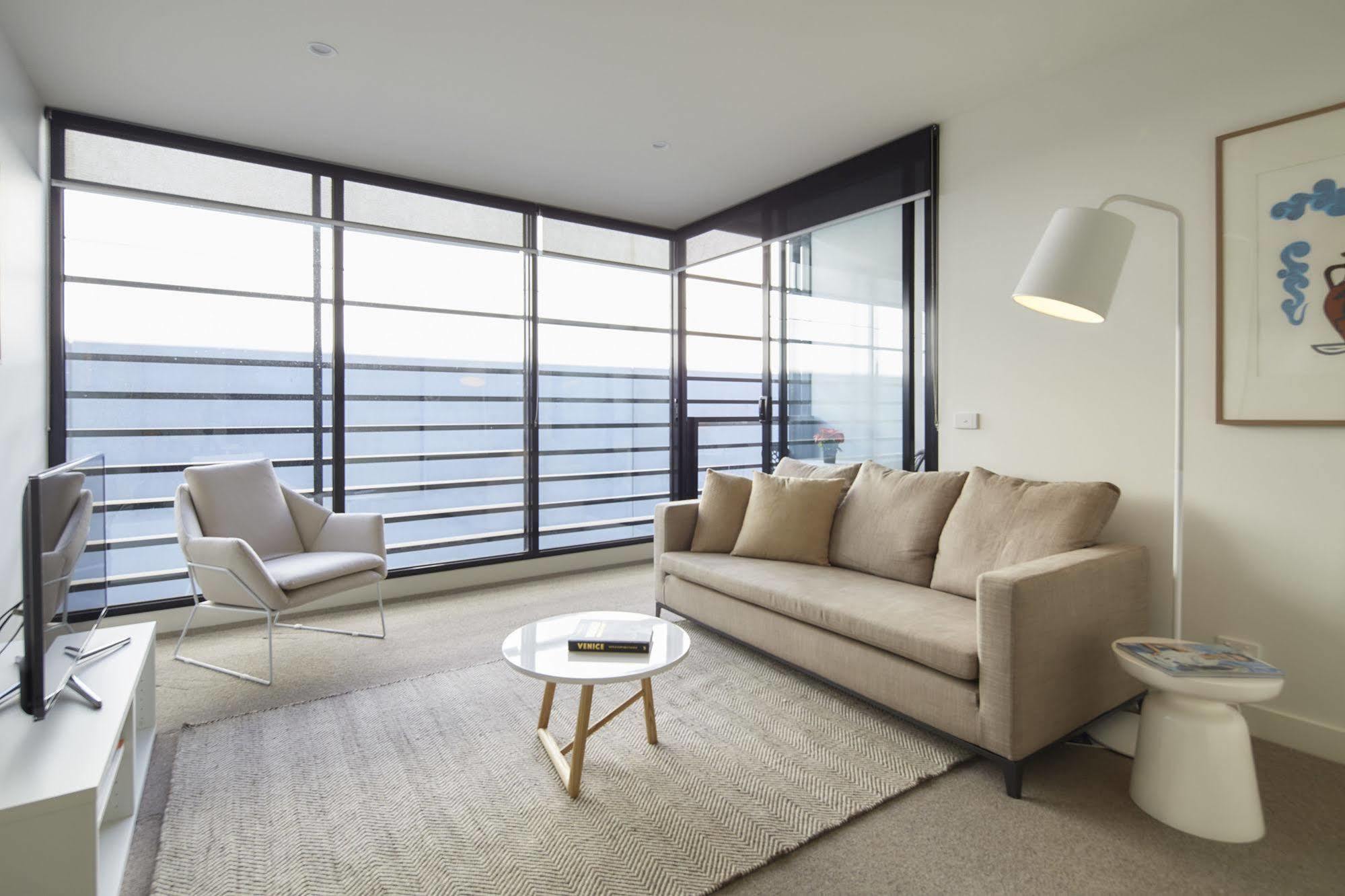 381 Cremorne Apartamentos Melburne Exterior foto A living room in a typical apartment